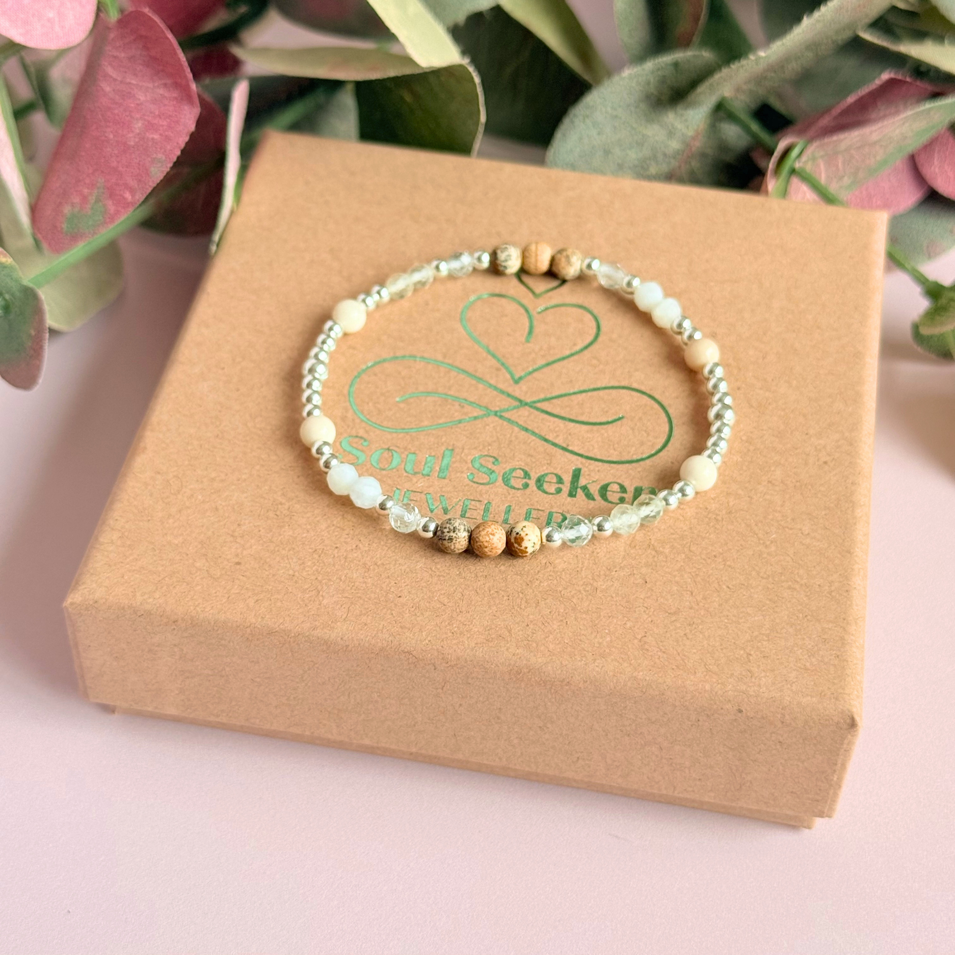 'Ibiza Bohemia' sterling silver dainty beaded bracelet with picture jasper, river stone jasper, citrine, clear quartz and moonstone. Made with round 3mm sterling silver beads and 4mm smooth and faceted round crystal gemstone beads. Pictured on the gift box