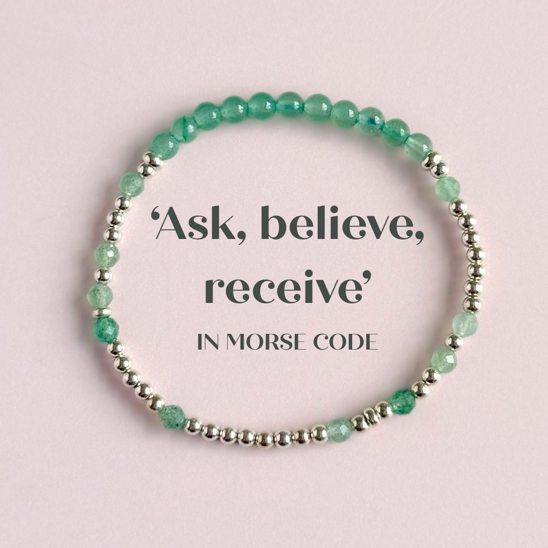 Green aventurine morse code bracelet that spells out the words ‘Ask, believe, receive’ in a combination of 4mm round smooth and faceted crystal beads with your choice of sterling silver or gold vermeil accent beads. Pictured in silver, from above