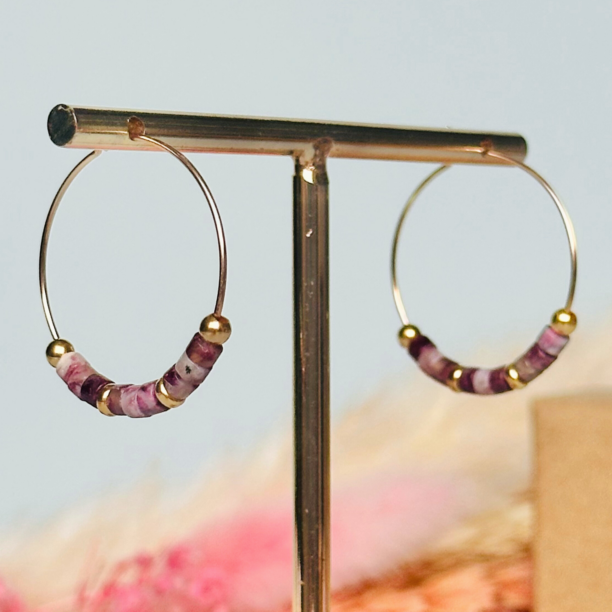 Pink tourmaline gold filled hoop earrings. Made with pink tourmaline heishi beads on 25mm gold filled hoops.