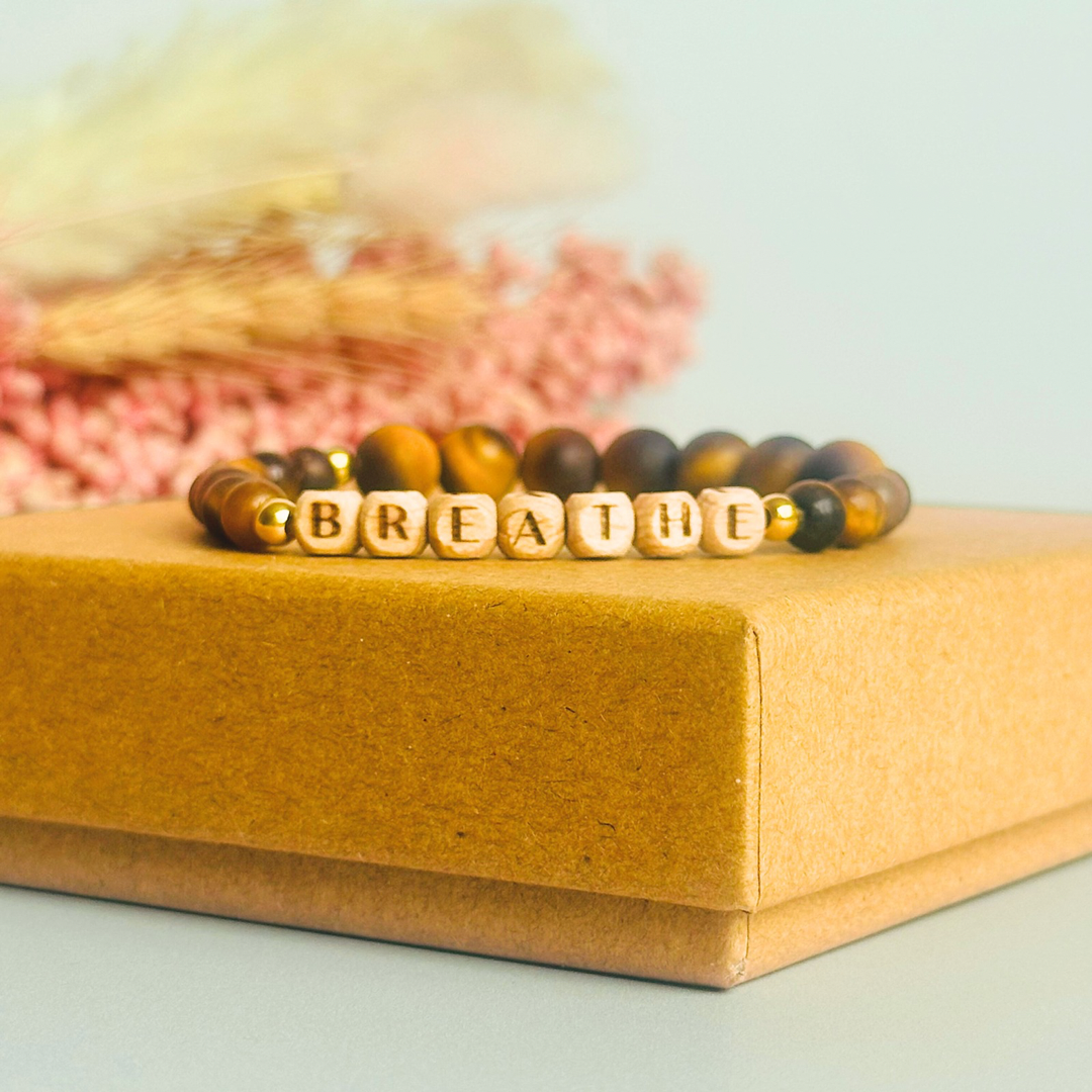 Breathwork bracelet featuring 6mm and 8mm frosted tigers eye crystal beads that follow the 4-7-8 counted breathing method. Also featuring laser engraved wooden letter beads spelling out the word BREATHE. Choose your accent beads from rose gold vermeil, gold vermeil or sterling silver.