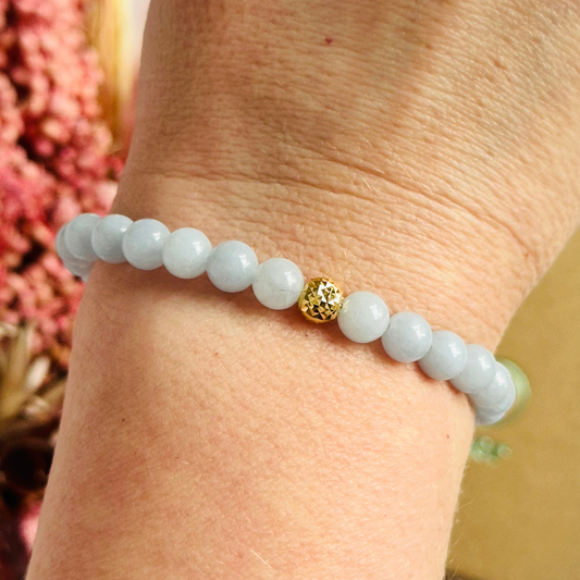 Aquamarine bracelet with a faceted sterling silver or gold vermeil focal bead. A bracelet for eternal youth. Made with 6mm beads.