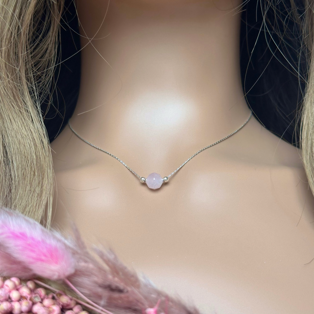 Rose quartz necklace featuring an 8mm star cut rose quartz bead with corrugated sterling silver beads on a delicate sterling silver cardano beading chain. The necklace fastens with a subtle yet secure sterling silver bolt clasp.