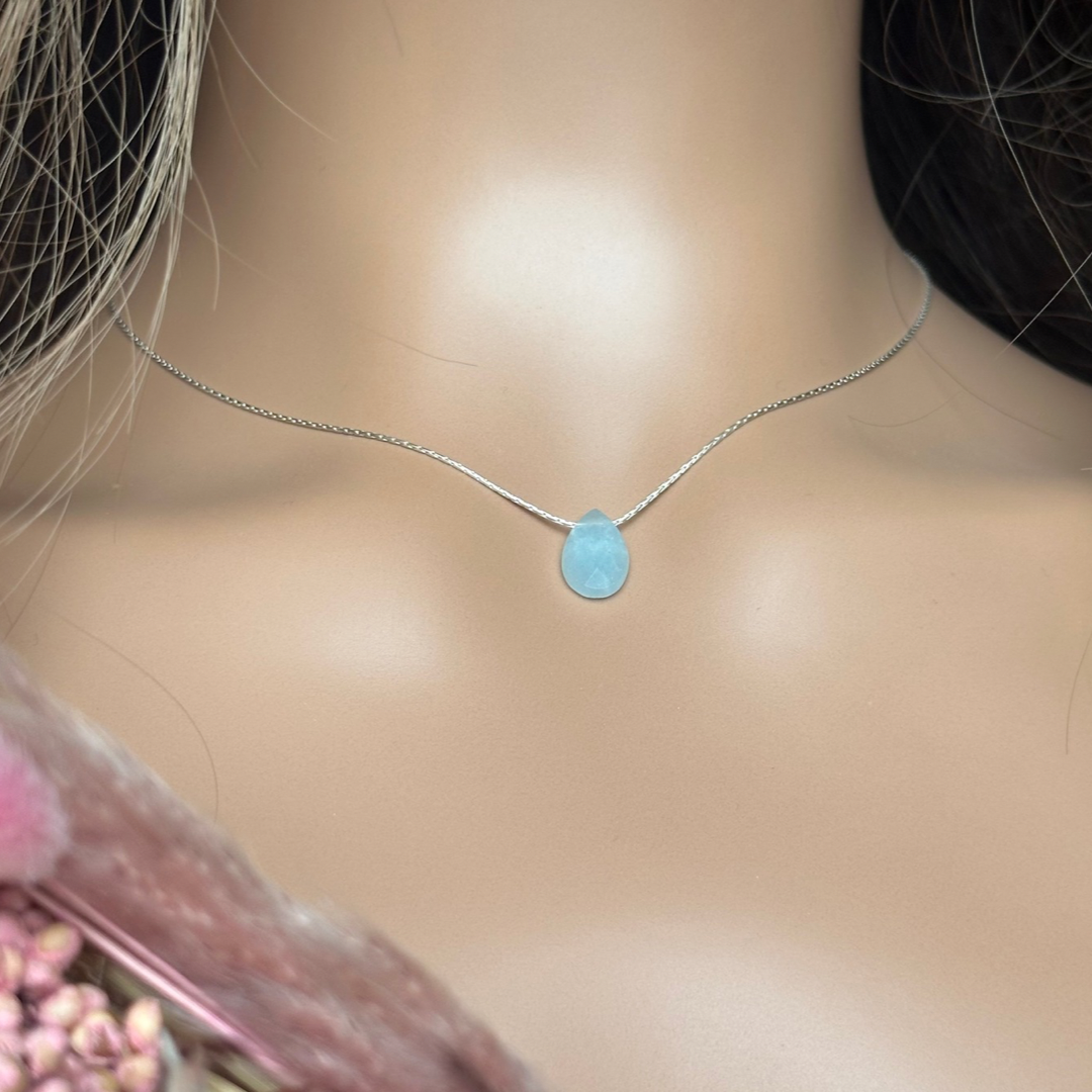 Dainty aquamarine teardrop necklace featuring a 12x8mm faceted aquamarine teardrop bead on a fine sterling silver cardano beading chain.