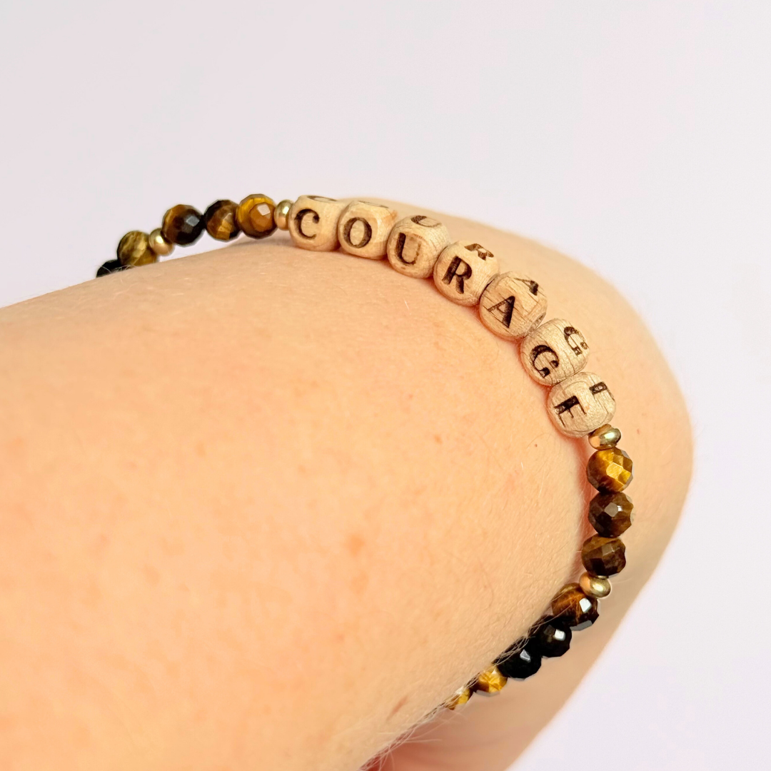 Bracelet featuring 5mm engraved wooden beads, which you can personalise with your choice of words, numbers and symbols. The main the band of the bracelet is made with 4mm faceted tigers eye round crystal gemstone beads. Finished with your choice of gold vermeil, sterling silver or rose gold vermeil accent beads.