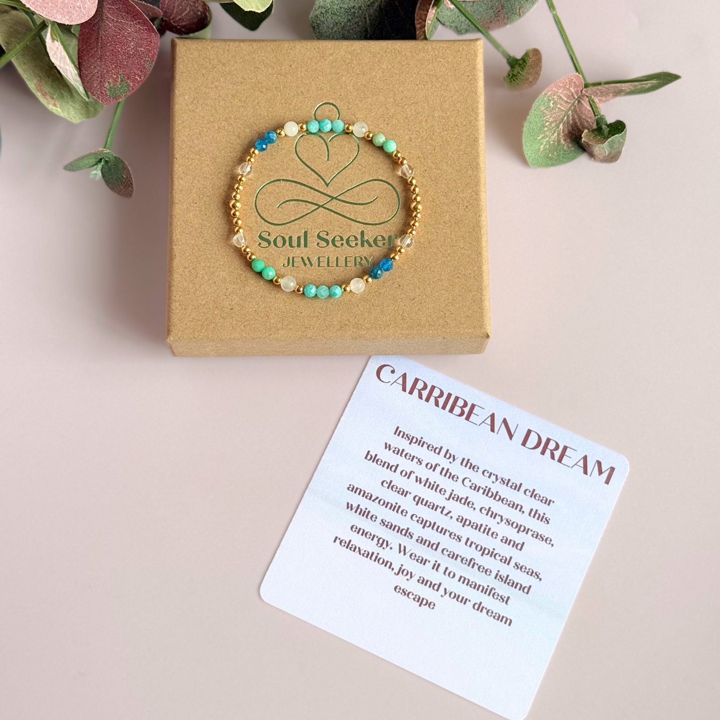 ‘Caribbean Dream' gold vermeil dainty beaded bracelet with white jade, chrysoprase, amazonite, apatite and clear quartz. Made with round 3mm gold vermeil beads and 4mm smooth and faceted round crystal gemstone beads. Pictured n the gift box, with the crystal information card 