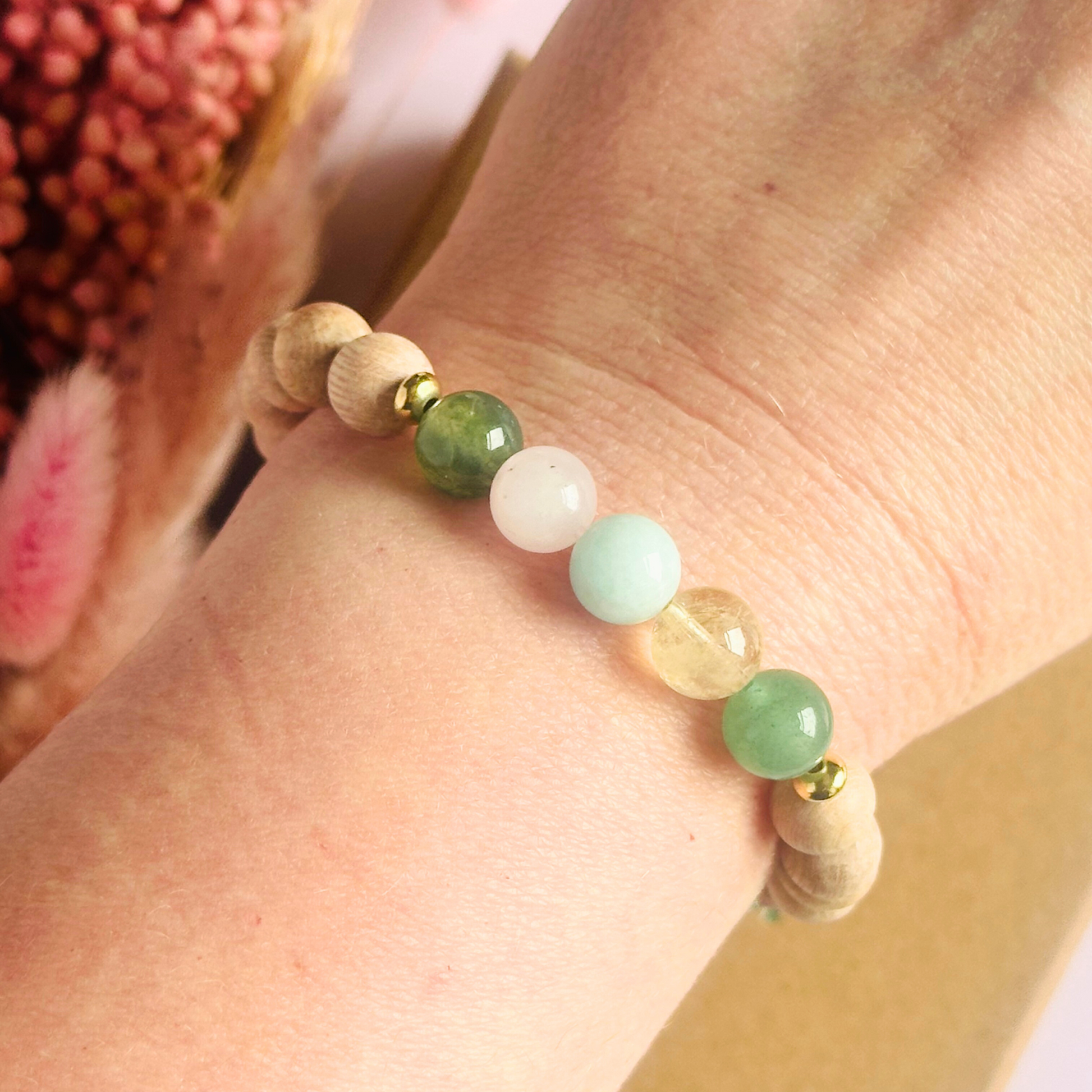 Spring crystal raw rosewood essential oil diffuser bracelet with moss agate, rose quartz, citrine, amazonite and green aventurine.