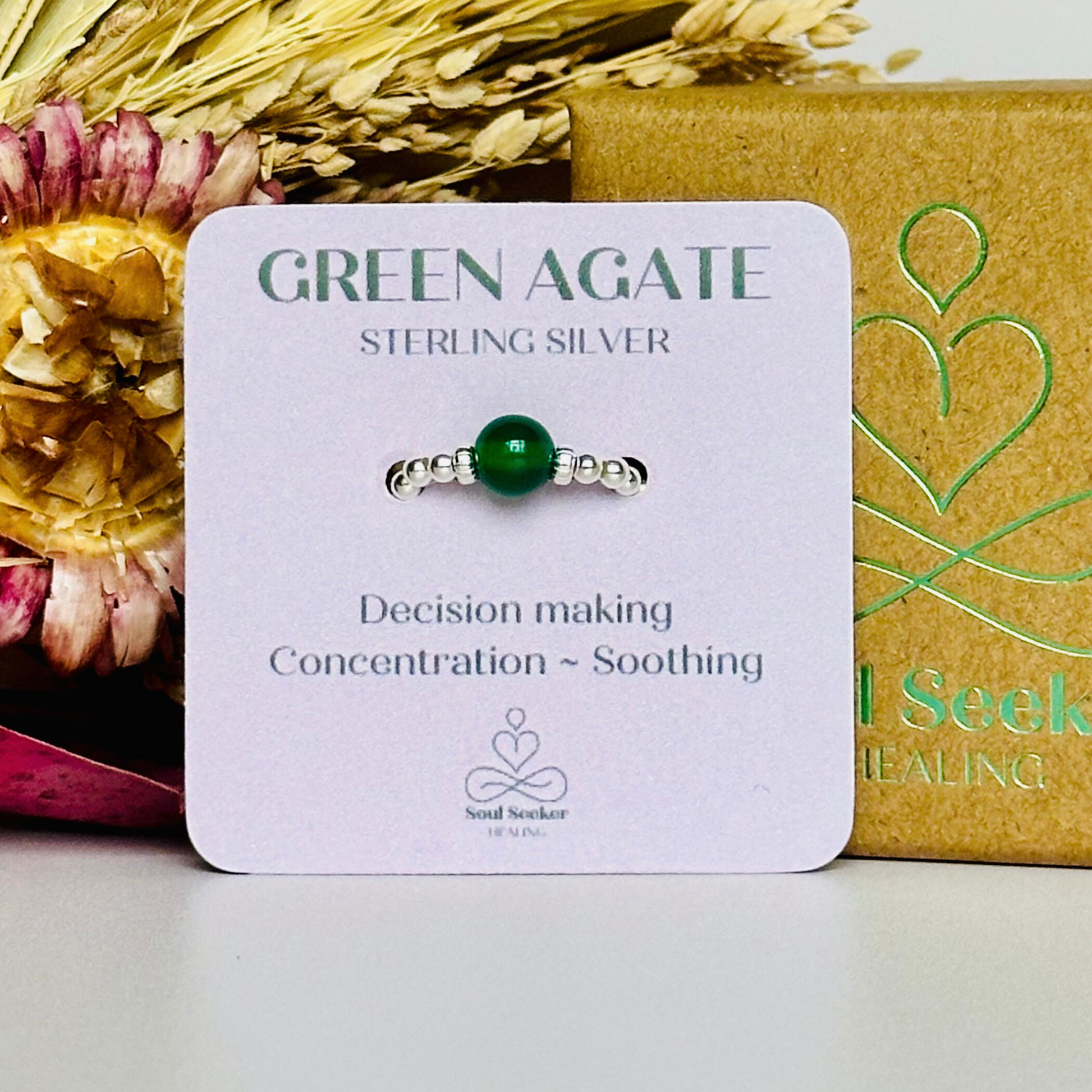 sterling silver green agate ring features a 6mm round ethically sourced green agate bead, surrounded by sterling silver corrugated rondelle beads and delicate 2.5mm sterling silver beads. By Soul Seeker Healing
