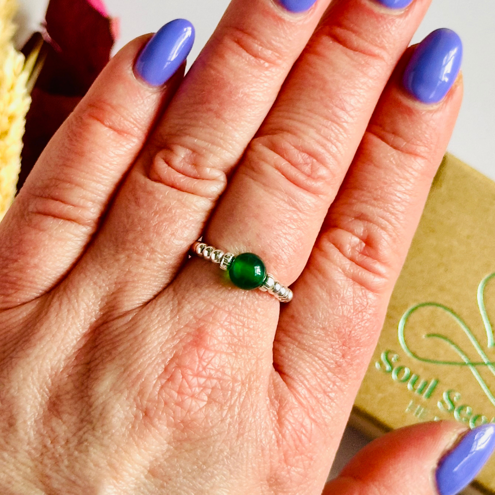 sterling silver green agate ring features a 6mm round ethically sourced green agate bead, surrounded by sterling silver corrugated rondelle beads and delicate 2.5mm sterling silver beads. By Soul Seeker Healing

